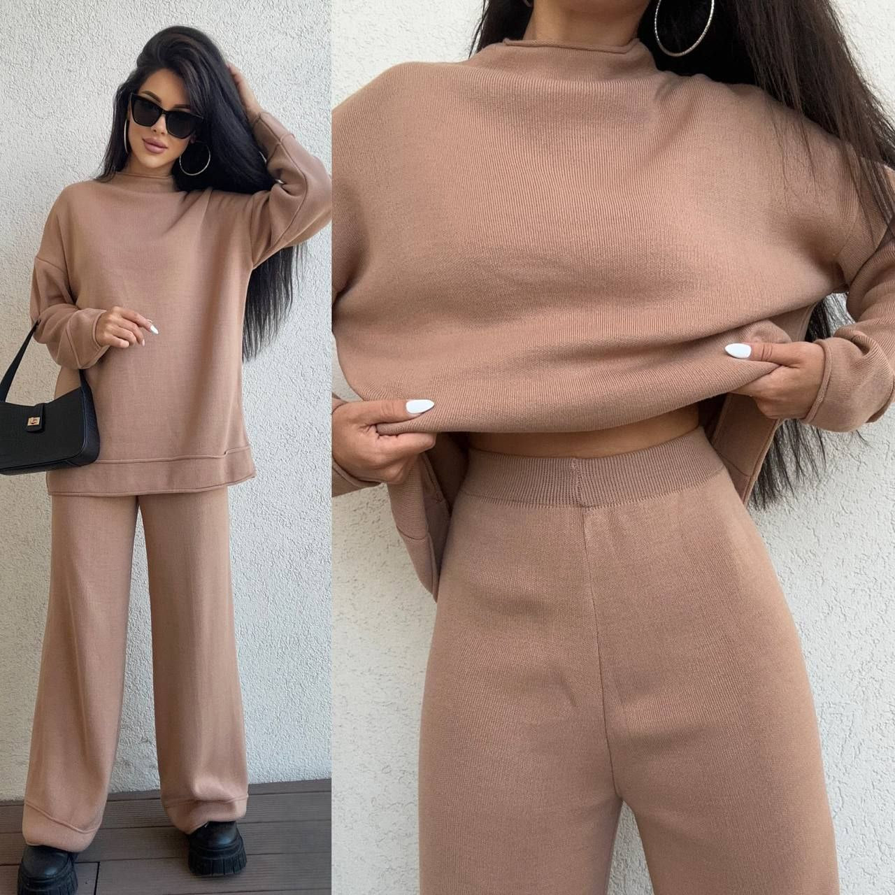 Woman wearing a beige tracksuit with close-up details against a neutral background