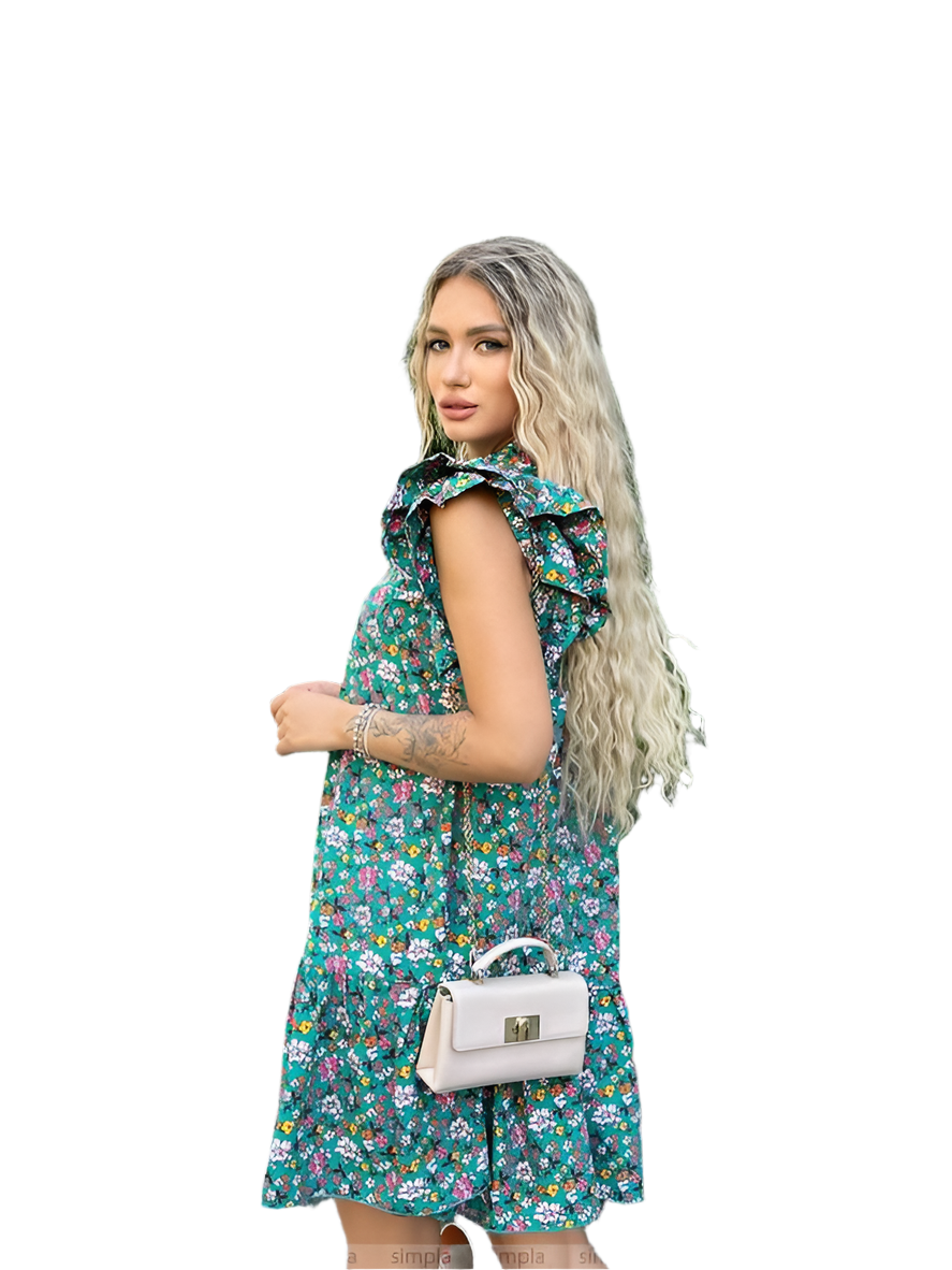 Woman wearing a floral dress holding a white handbag on a white background