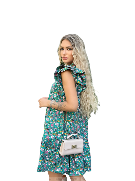 Woman wearing a floral dress holding a white handbag on a white background
