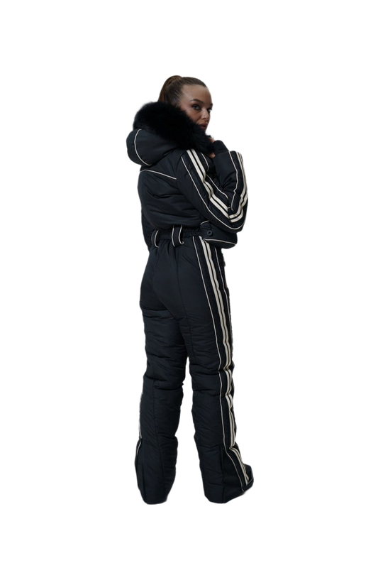 Person wearing a black snowsuit with white stripes on a white background