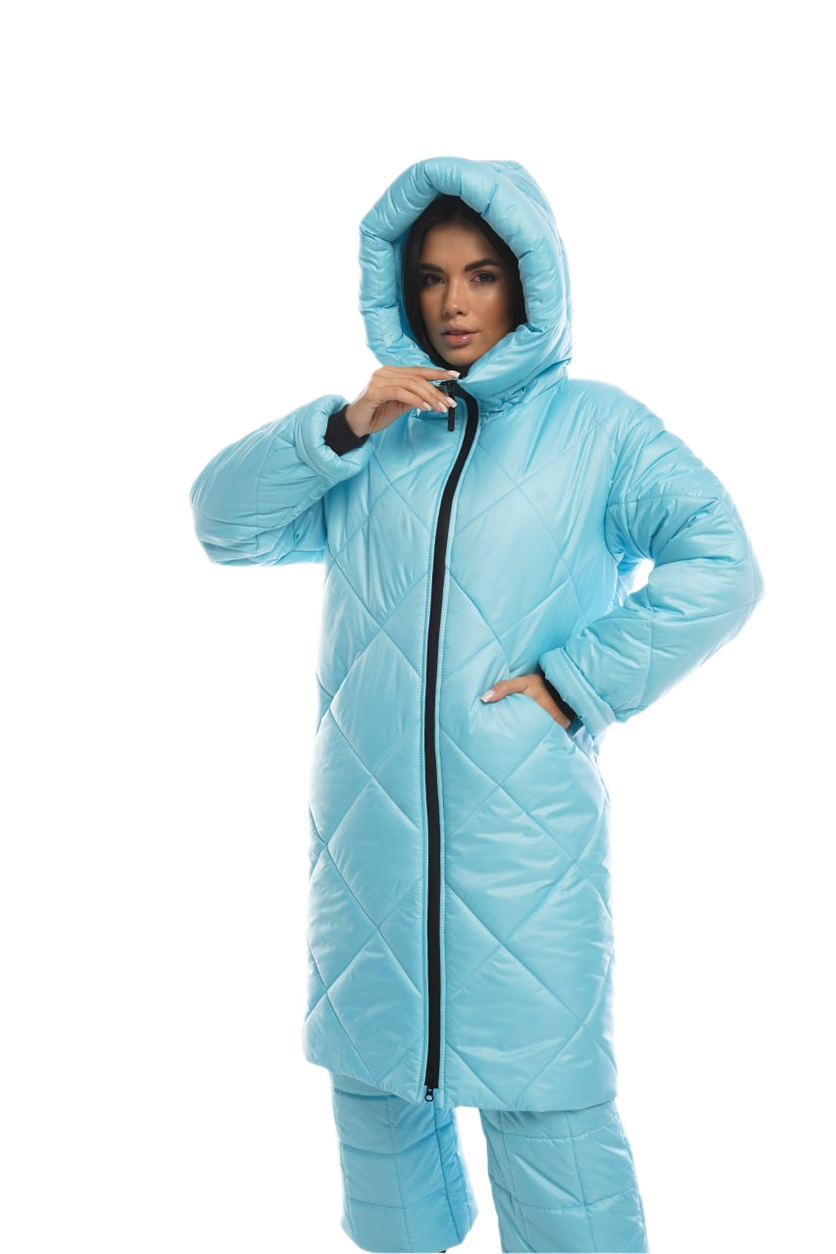 Person wearing a light blue quilted jacket and pants on a white background