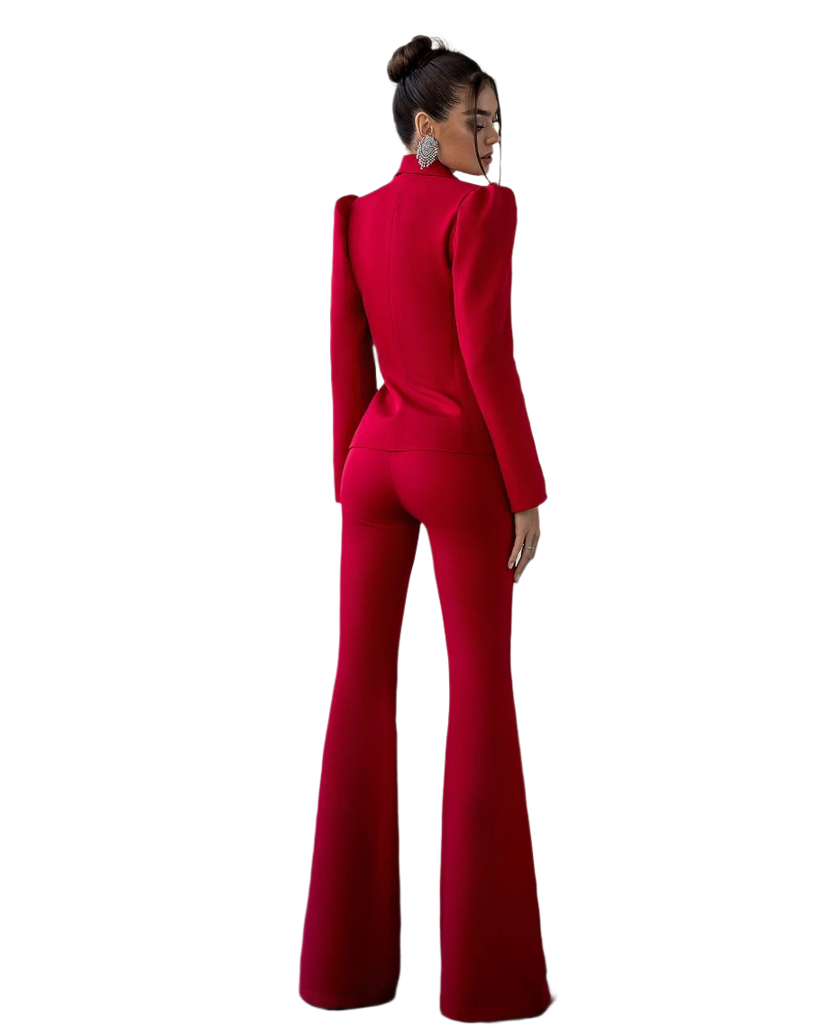 Red jumpsuit worn by a model on a white background