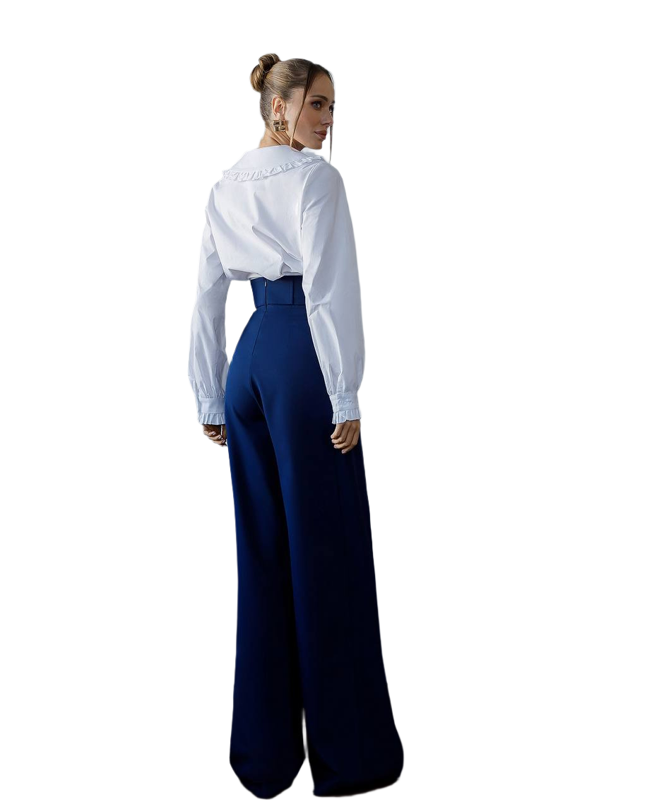 Person wearing a white blouse and blue high-waisted pants on a white background