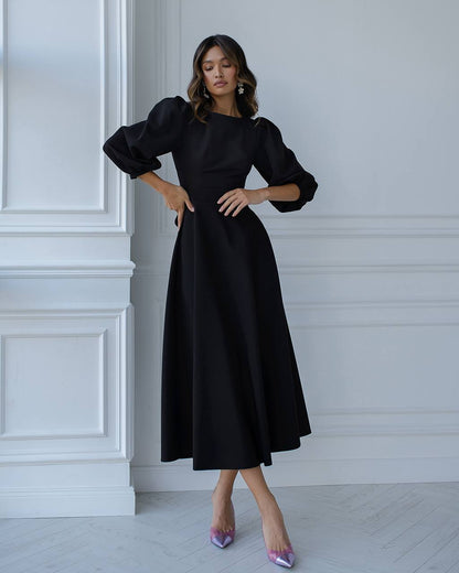 Elegant Midi Dress with Puff Sleeves and Cutout Back in Black
