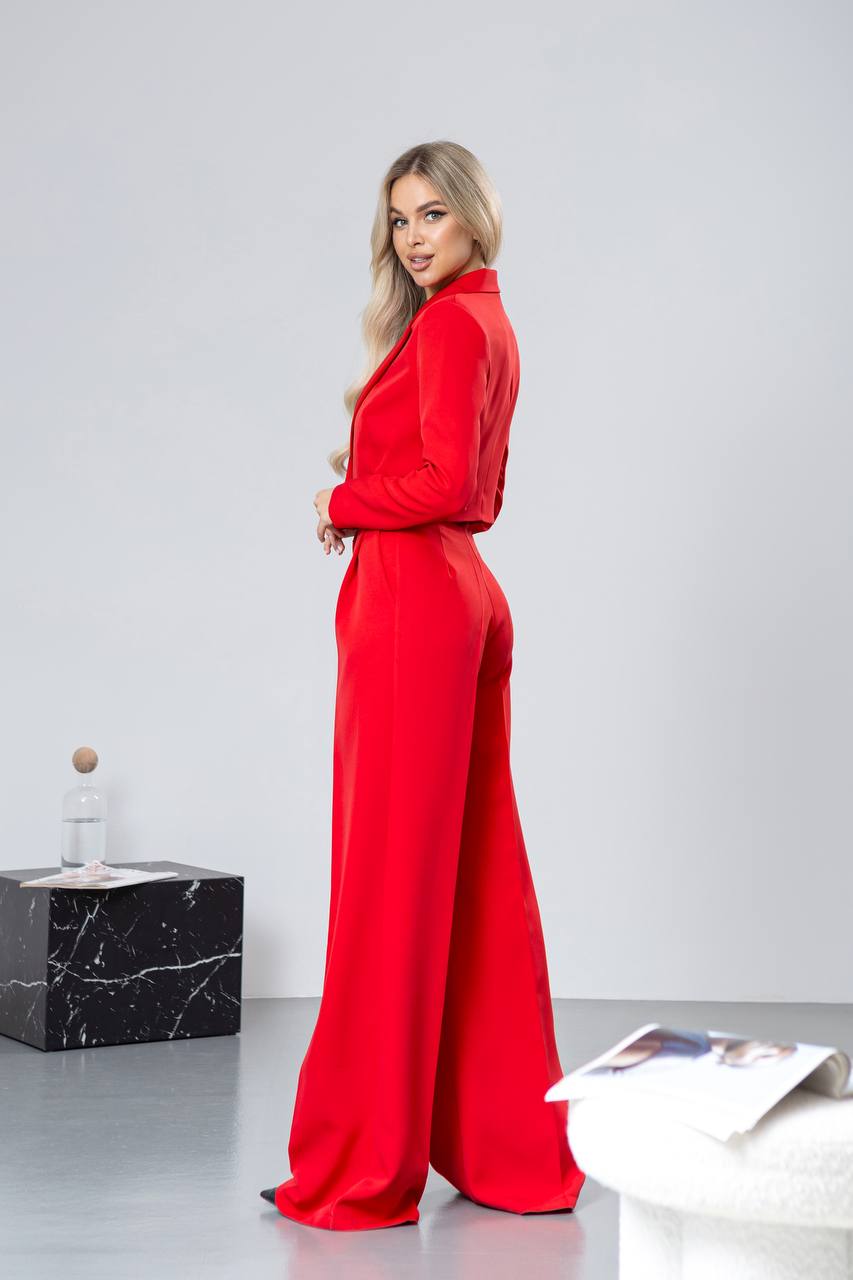 Woman wearing a red outfit on a white background