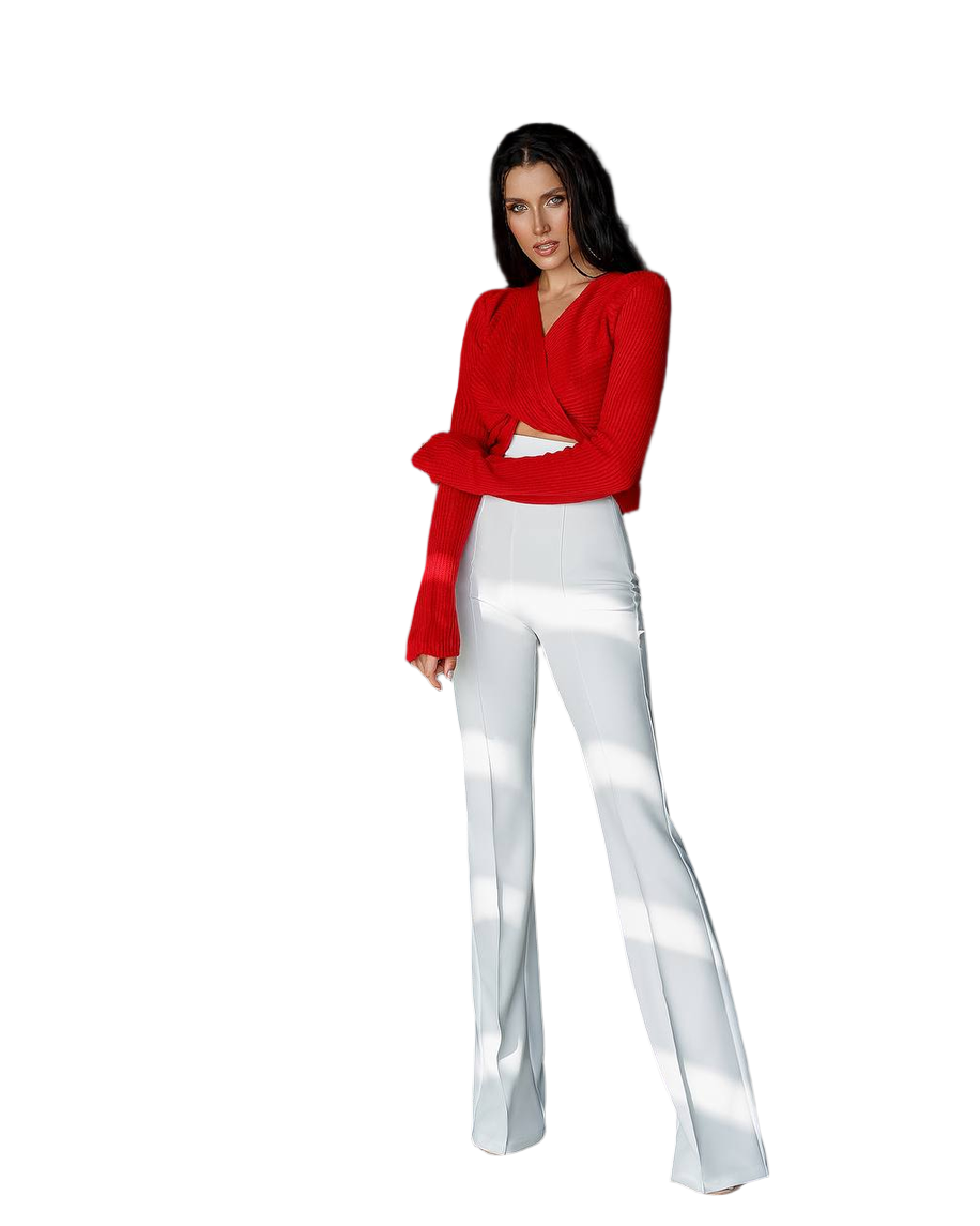 Woman wearing a red blouse and white pants on a white background