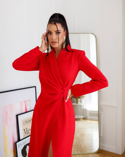 Woman wearing a red jumpsuit in an indoor setting