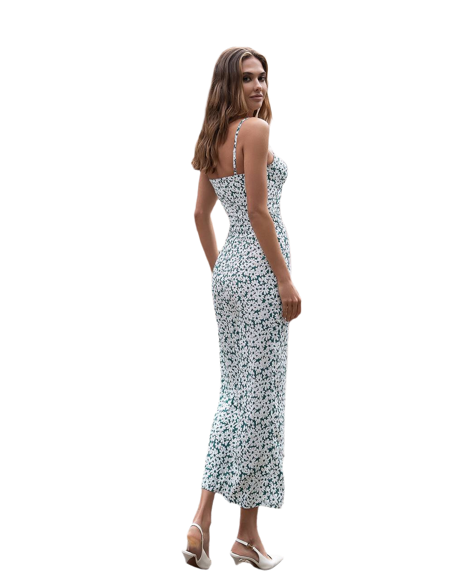 Woman wearing a floral dress on a white background