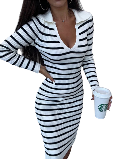 Person wearing a black and white striped dress holding a Starbucks cup on a white background