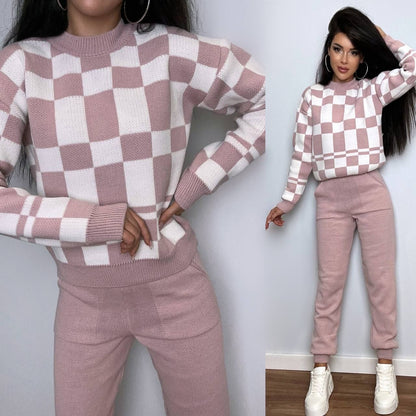 Two images of a person wearing a pink and white checkered sweater and pants set against a plain background.