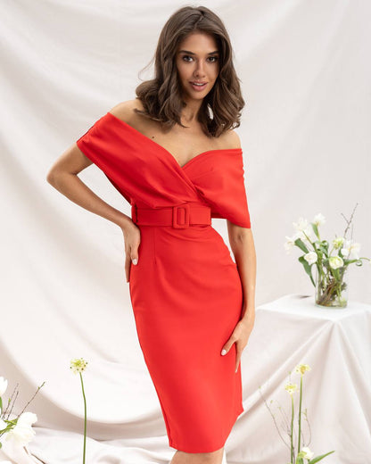 Woman wearing a red off-shoulder dress against a white background