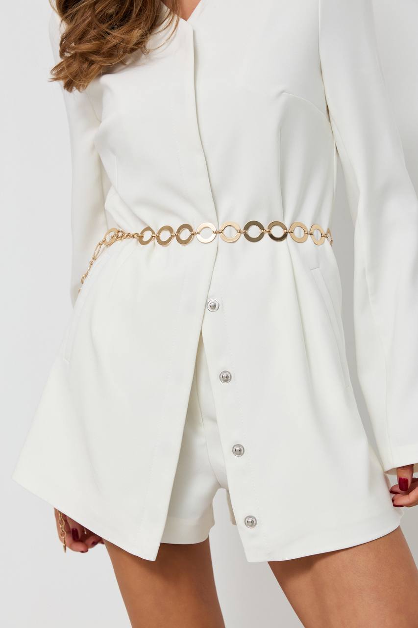White blazer with gold chain belt on a white background