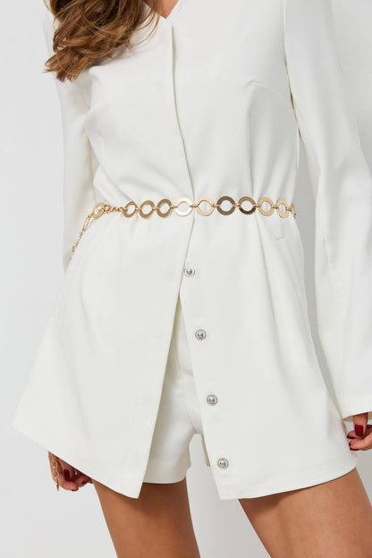 White blazer with gold chain belt on a white background