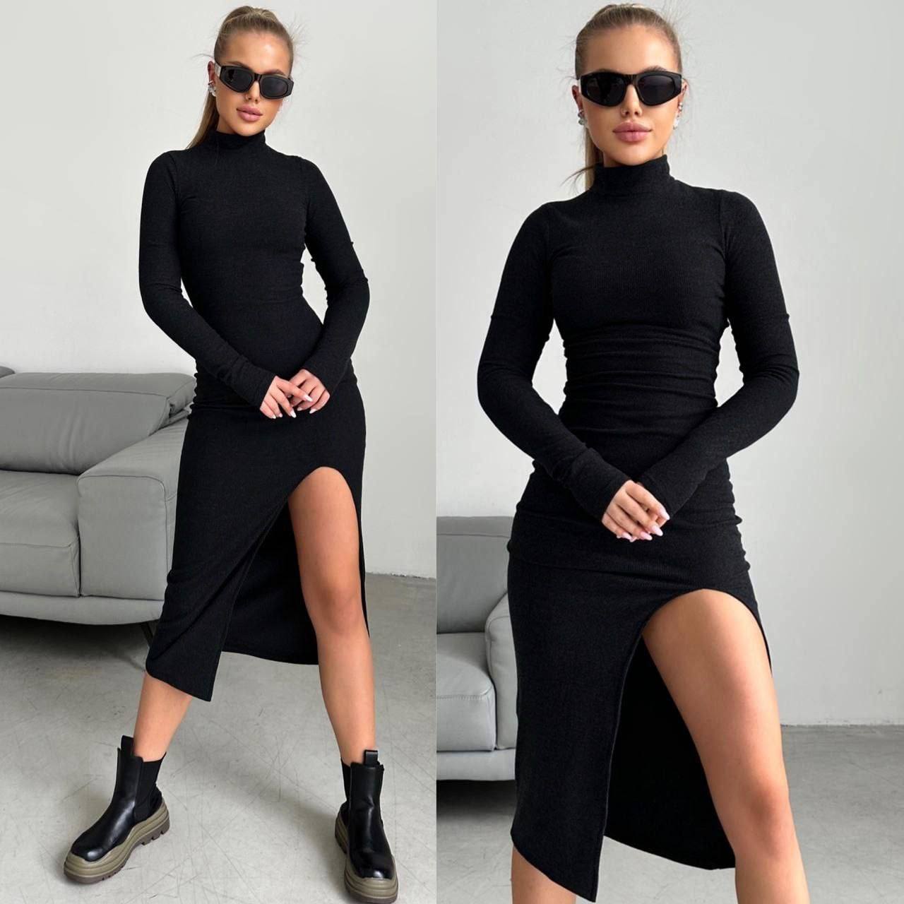 Woman wearing a black dress with a high slit in two different poses against a neutral background.