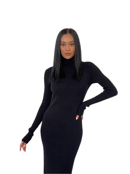 Woman wearing a black ribbed dress on a white background