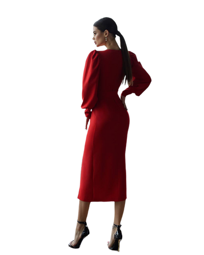 Woman wearing a red dress against a white background