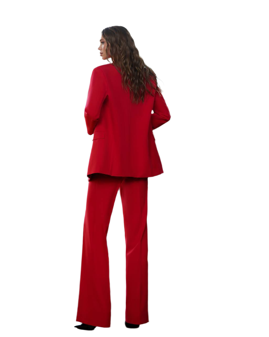 Woman wearing a red suit on a white background