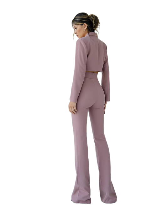Woman wearing a mauve suit on a white background