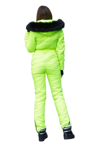 Person wearing a bright green ski suit with black fur trim on a white background