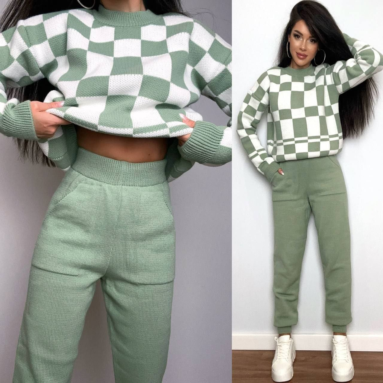 Green and white checkered sweater and pants set worn by a person against a plain background.