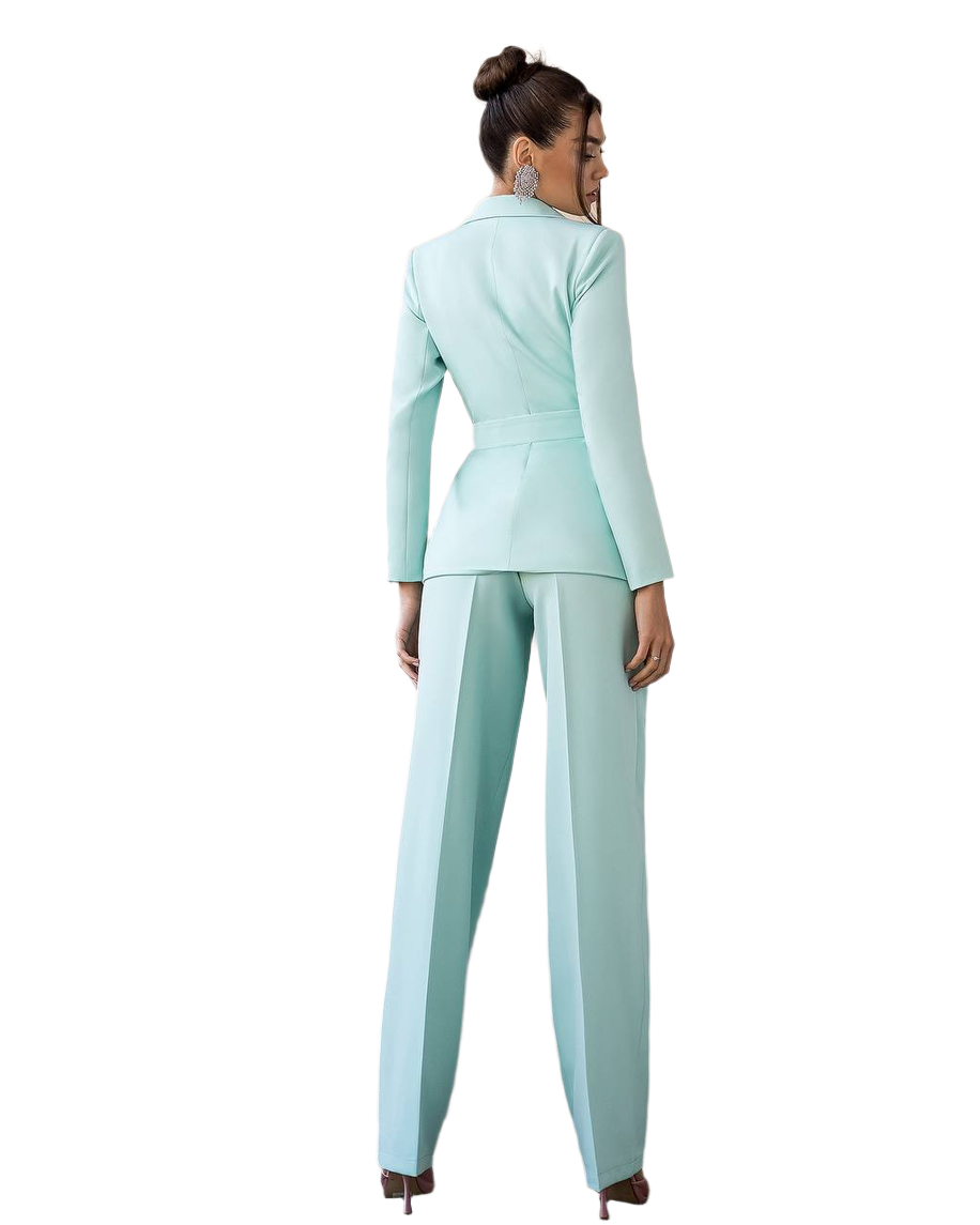 Woman wearing a light blue suit on a white background