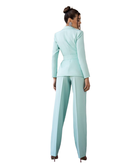 Woman wearing a light blue suit on a white background
