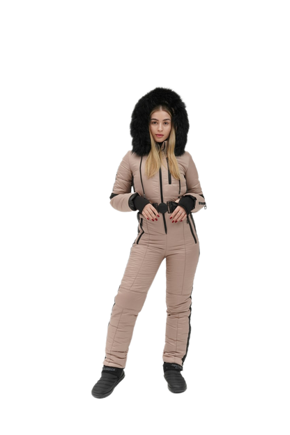 Woman wearing a beige snowsuit with a black hood on a white background