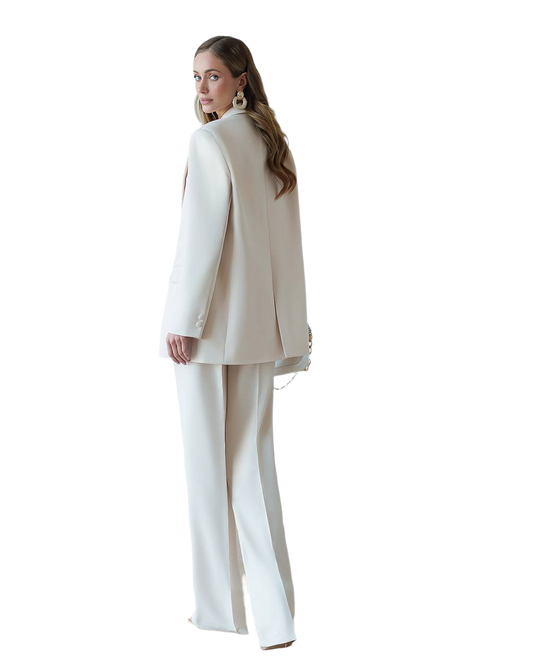 Woman wearing a beige suit on a white background