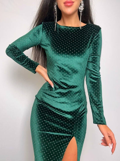 Green glittery dress with long sleeves on a white background