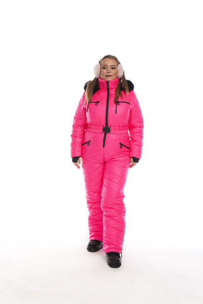 Person wearing a bright pink snowsuit on a white background