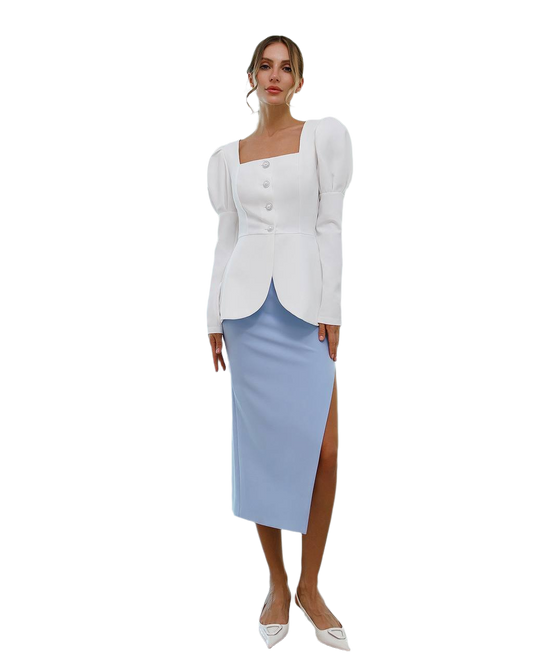 Woman wearing a white top with puff sleeves and a light blue skirt on a white background