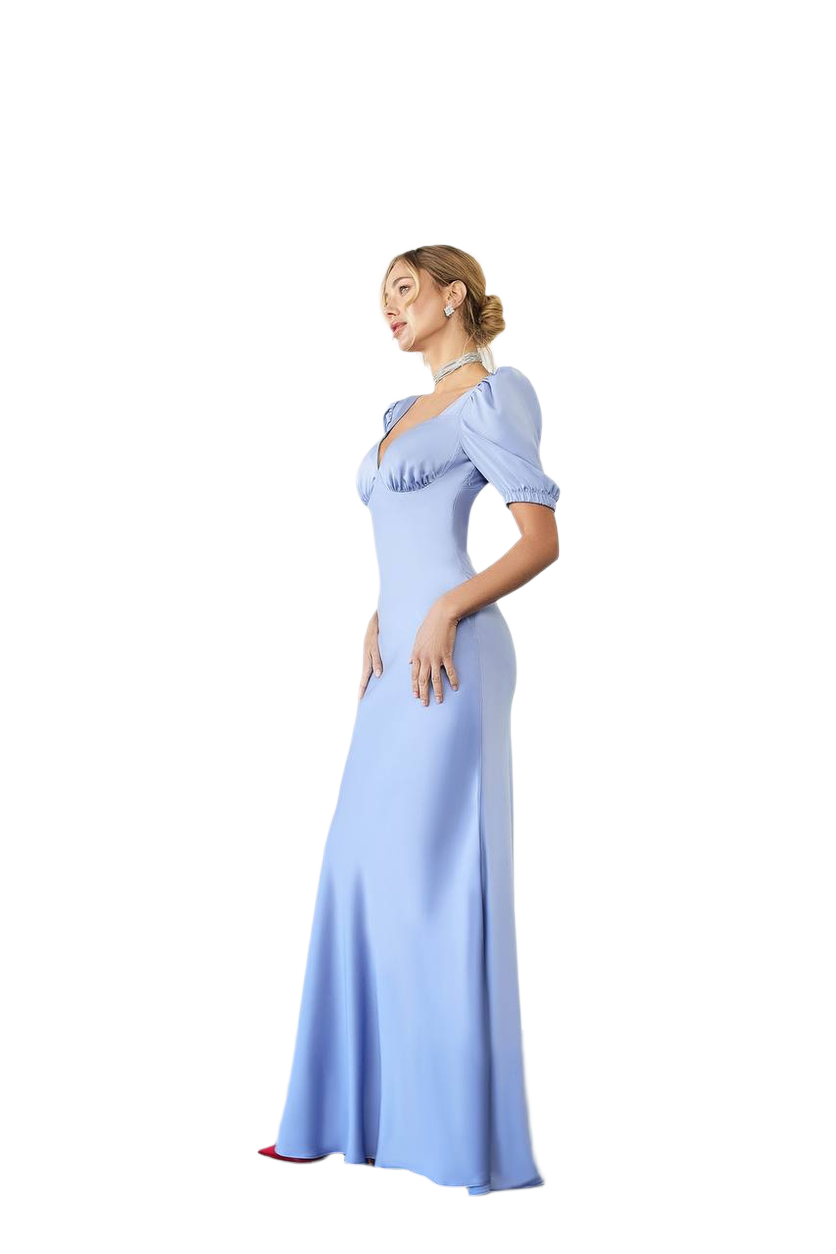 Woman wearing a light blue evening gown on a white background
