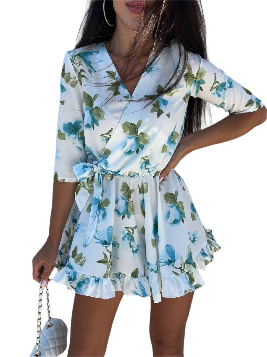 Woman wearing a floral dress with a white background