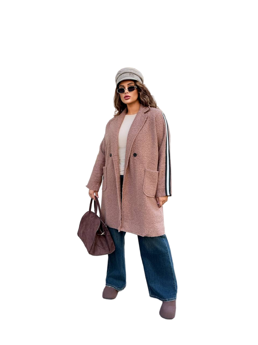 Woman wearing a pink coat with a white background