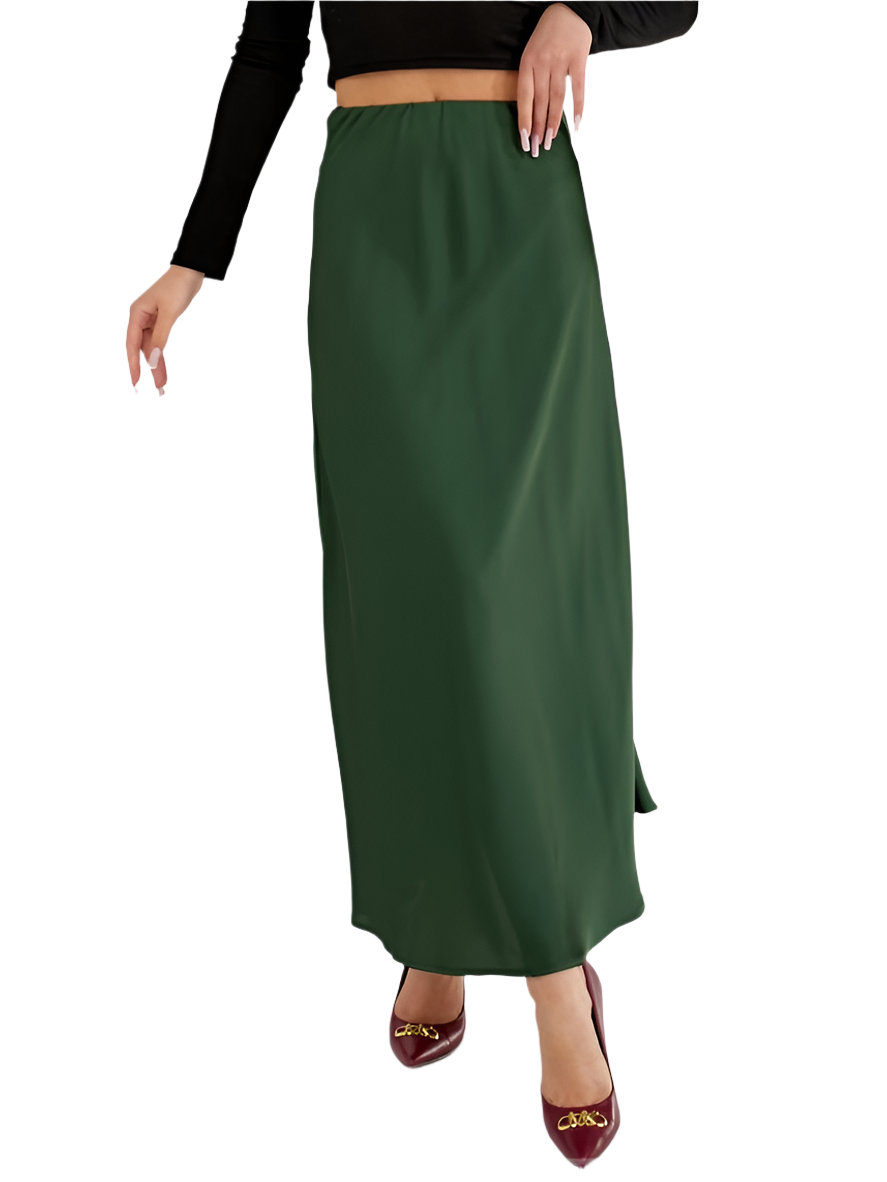 Green skirt worn by a person on a white background