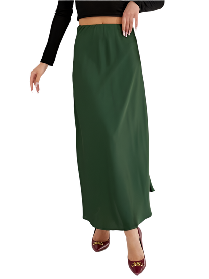 Green skirt worn by a person on a white background