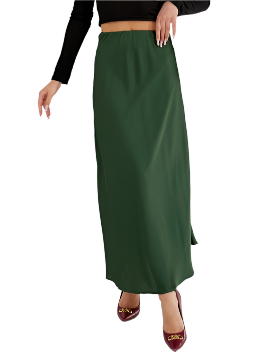 Green skirt worn by a person on a white background
