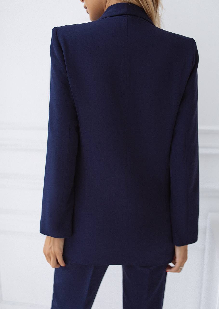Navy blue suit jacket on a white background
