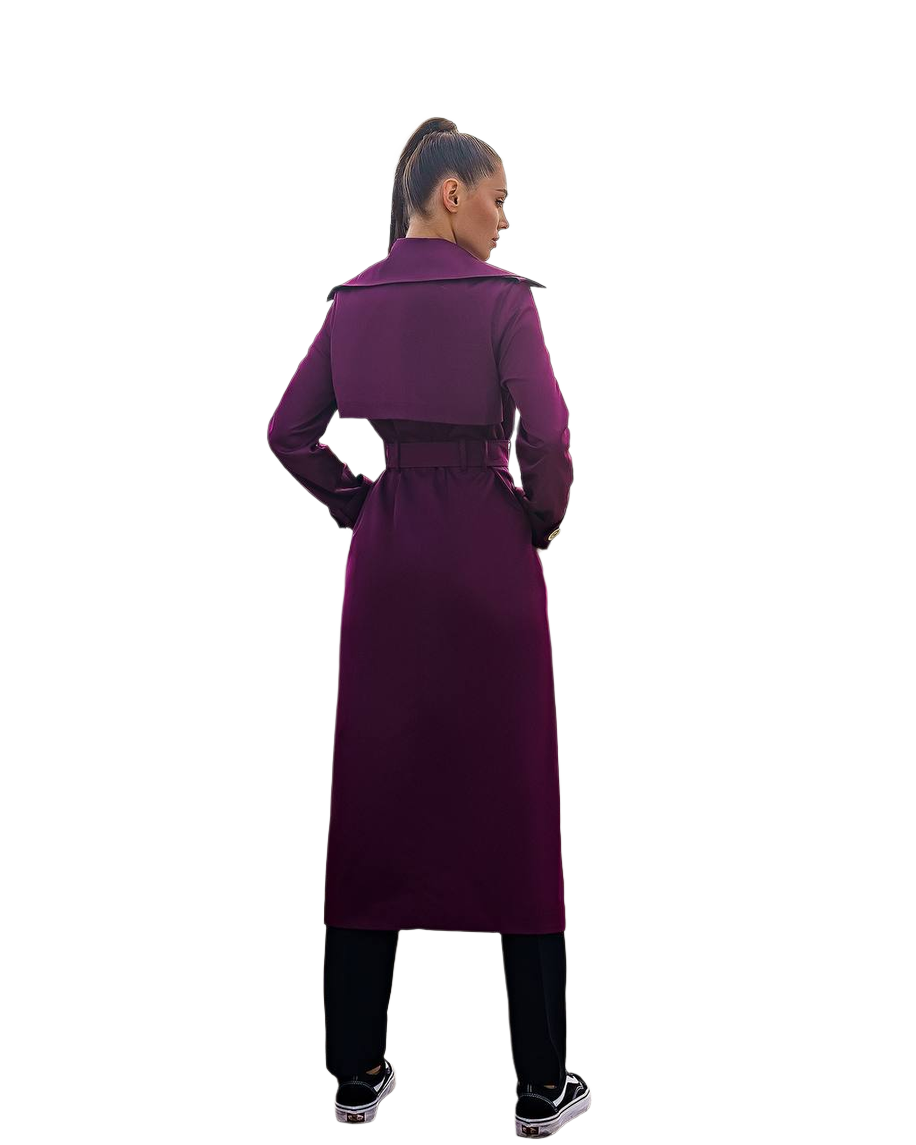 Person wearing a long purple coat on a white background