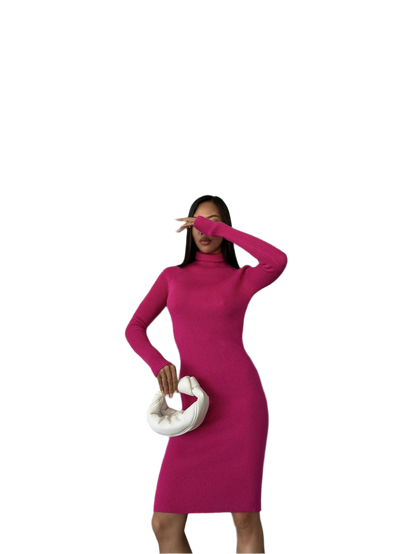 Woman wearing a bright pink dress holding a white clutch against a white background