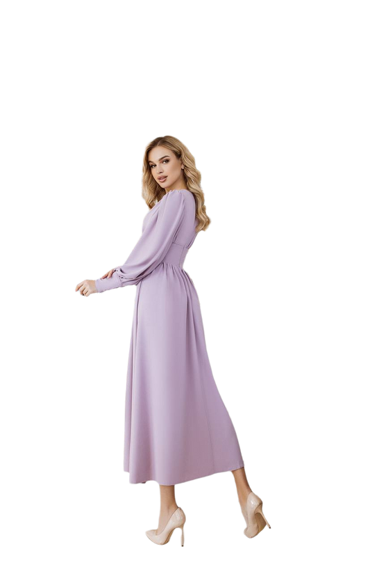 Woman wearing a long purple dress on a white background