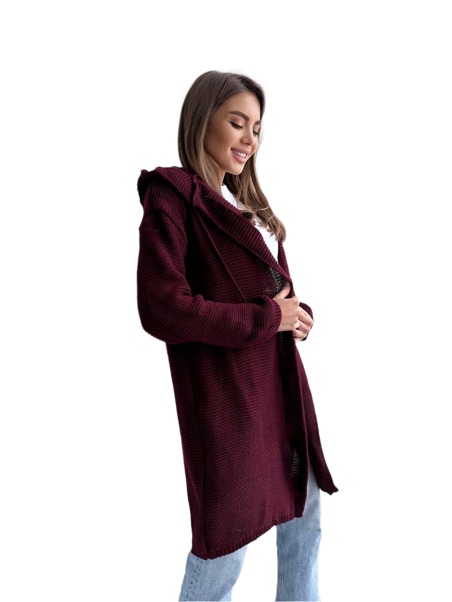 Woman wearing a burgundy coat on a white background