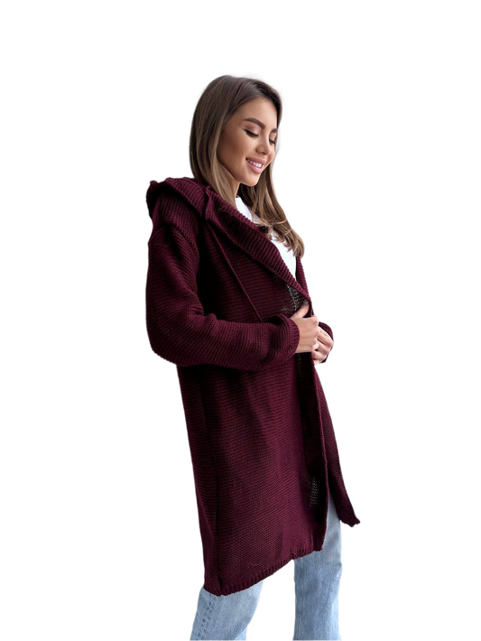 Woman wearing a burgundy coat on a white background