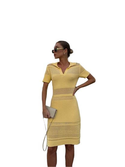 Woman wearing a yellow dress with a white background