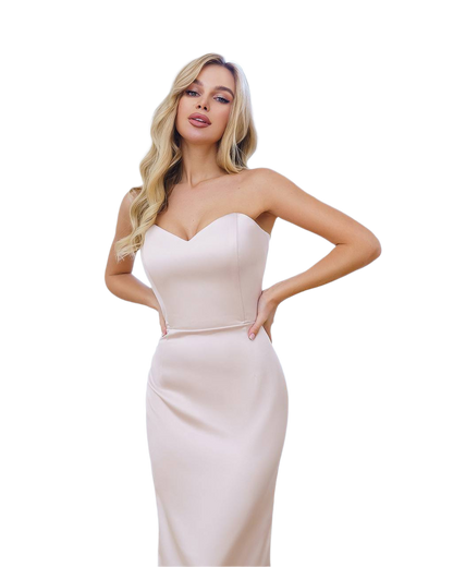 Woman wearing a strapless white dress on a white background
