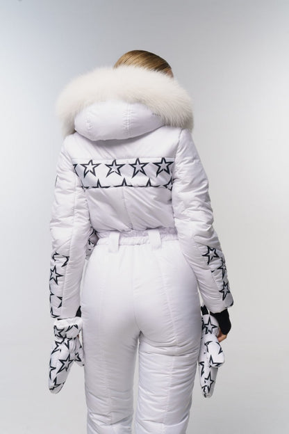 White puffer jacket with star patterns and fur hood on a plain background