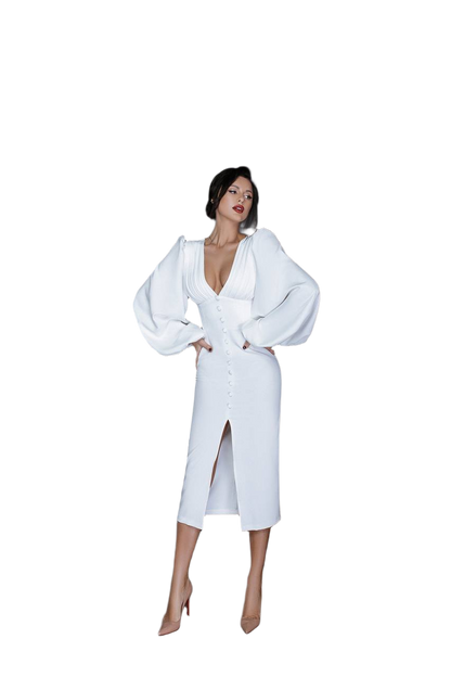 Woman wearing a white dress with wide sleeves on a white background