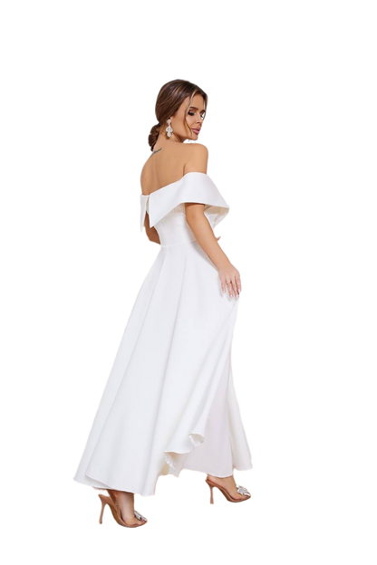 Woman wearing a white off-shoulder dress on a white background