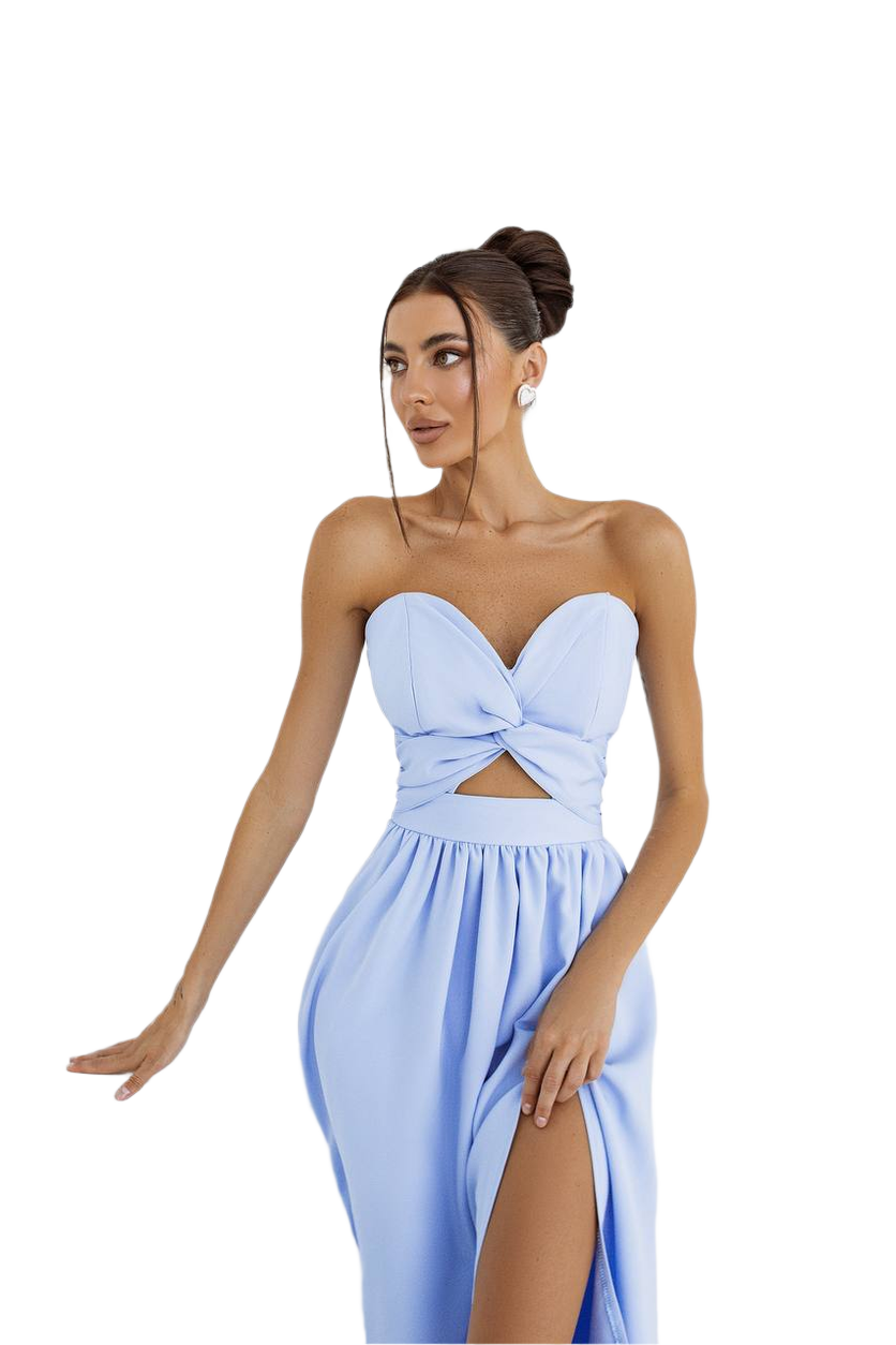 Woman wearing a light blue strapless dress with a cutout design on a white background