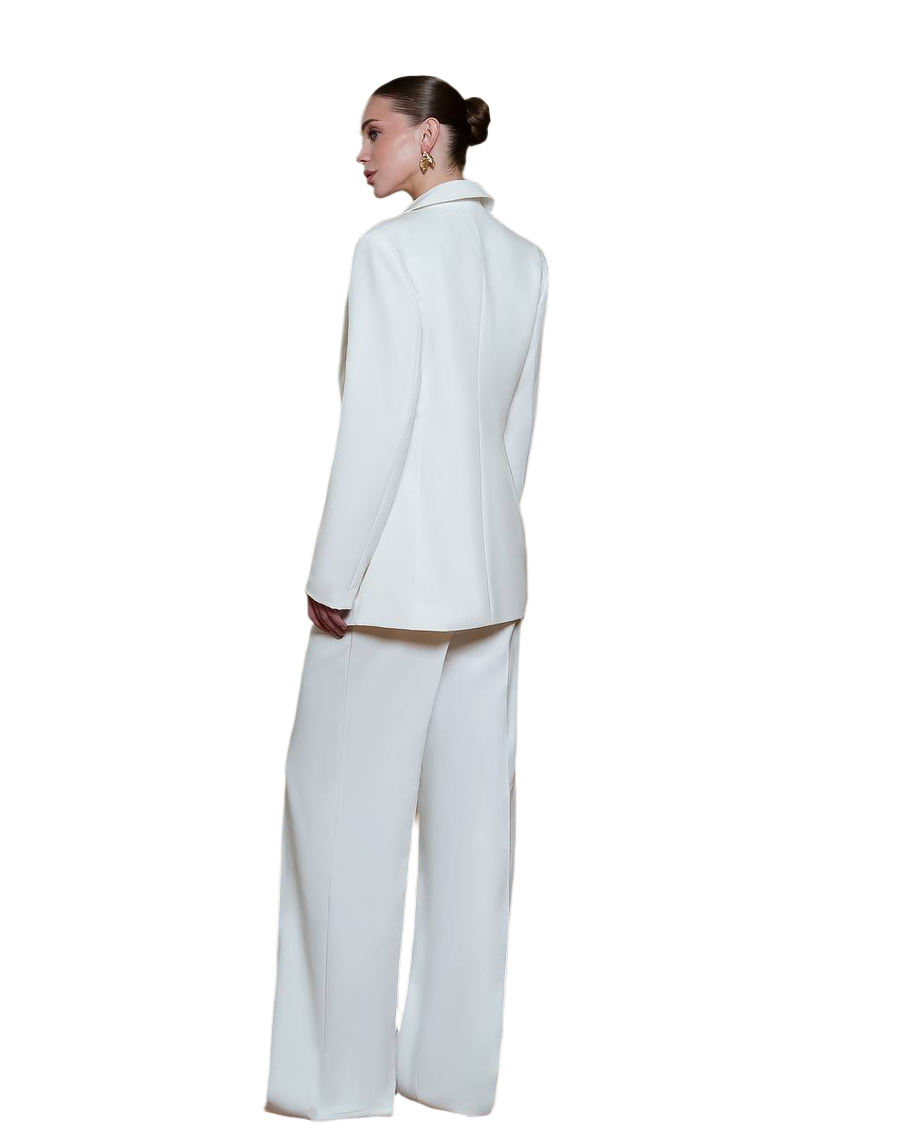 Person wearing a white suit on a white background